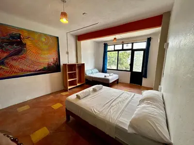 Cama o camas de una habitación en Hotel Manava