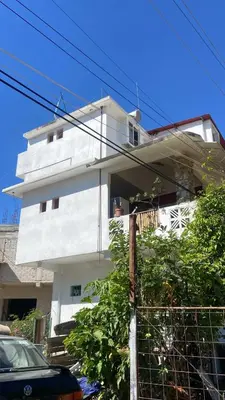 Edificio en el que se encuentra la habitación en casa particular