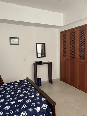 Cama o camas de una habitación en Increíble depto. en playa privada.
