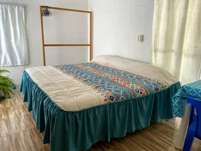 Cama o camas de una habitación en Casa Mamá Lolis