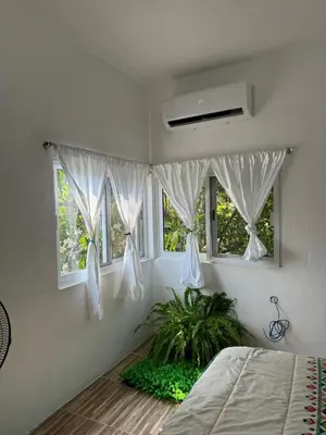 Cama o camas de una habitación en Casa Mamá Lolis