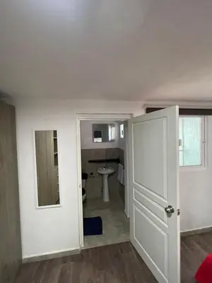 Una televisión o centro de entretenimiento en Casa palmera