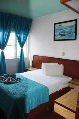 Cama o camas de una habitación en Hotel Los Diamantes Orizaba
