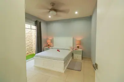 Cama o camas de una habitación en Encantador apartamento a 10 min en vehículo del Zócalo de Oaxaca