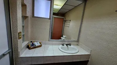 Un baño de Hotel Hacienda del Rio Oaxtepec