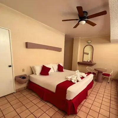 Cama o camas de una habitación en Hotel Hacienda del Rio Oaxtepec