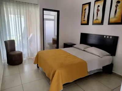 Cama o camas de una habitación en CASA MYAA, casa para noche, día, fin de semana, semana y mes