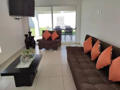Zona de estar de CASA MYAA, casa para noche, día, fin de semana, semana y mes
