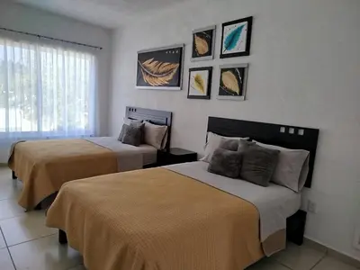 Cama o camas de una habitación en CASA MYAA, casa para noche, día, fin de semana, semana y mes