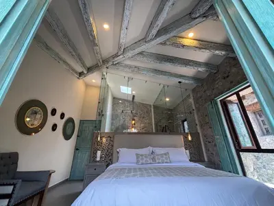 Cama o camas de una habitación en Castello di Carlo - Suite Carlo V