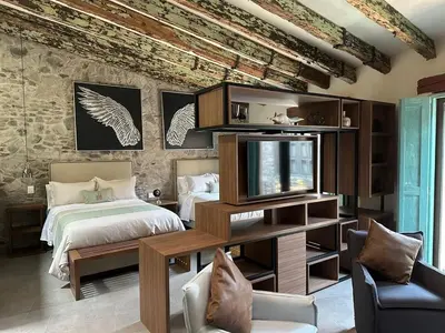 Cama o camas de una habitación en Castello di Carlo - Loft Carlo VI