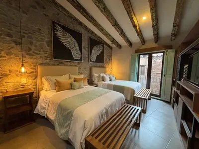 Cama o camas de una habitación en Castello di Carlo - Loft Carlo VI