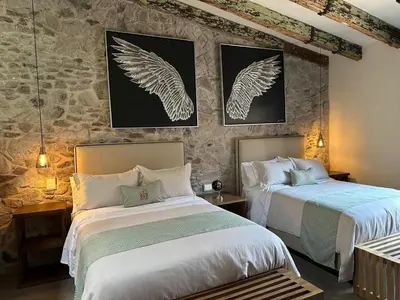 Cama o camas de una habitación en Castello di Carlo - Loft Carlo VI