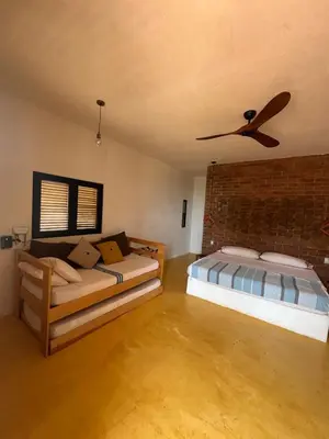 Cama o camas de una habitación en Cabañas Mizontle