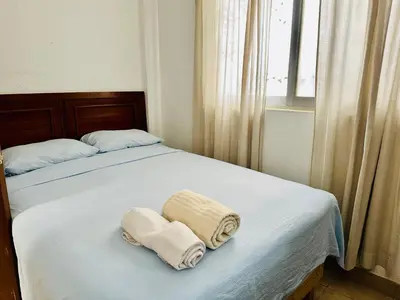 Cama o camas de una habitación en Casita Iluminada