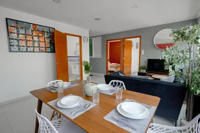 Una televisión o centro de entretenimiento en Amazing apartment close to Foro Sol Colonia Roma Airport and Downtown