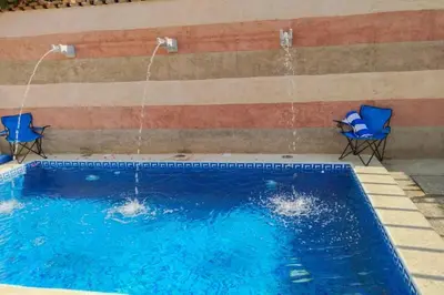 Piscina en o cerca de Habitación Exclusiva King Size con Alberca Climatizada