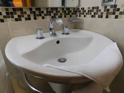 Un baño de Suites del Valle