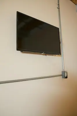 Una televisión o centro de entretenimiento en Kali Oaxaca Hostel