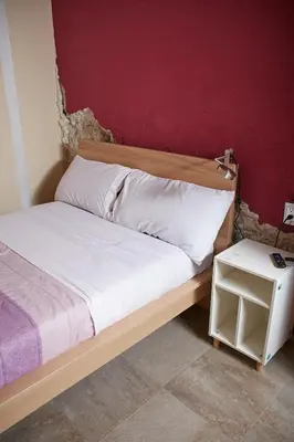 Cama o camas de una habitación en Kali Oaxaca Hostel