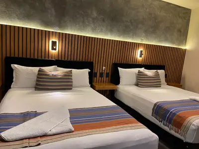 Cama o camas de una habitación en Hotel Aeropuerto Tuxtla Gutierrez Ernesto Garcia