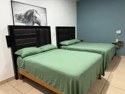 Cama o camas de una habitación en Loft Brisa Del Mar #9