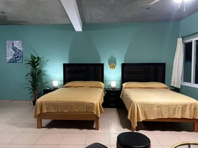 Cama o camas de una habitación en Brisa Del mar #5