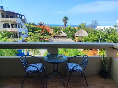 Un balcón o terraza de Adelfa Suites