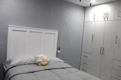 Cama o camas de una habitación en Comodo apartamento de 3 habitaciones, a 10 min en vehiculo del Zocalo de Oaxaca