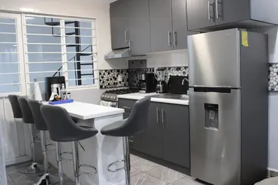 Una cocina o zona de cocina en Comodo apartamento de 3 habitaciones, a 10 min en vehiculo del Zocalo de Oaxaca