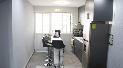 Una cocina o zona de cocina en Comodo apartamento de 3 habitaciones, a 10 min en vehiculo del Zocalo de Oaxaca