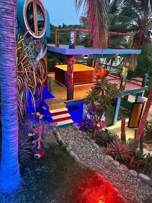 Jardín al aire libre en Beachfront Paradise Boutique Hotel - Alebrijes Jacuzzi Suits