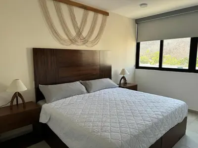 Cama o camas de una habitación en Nabani Condominios T2