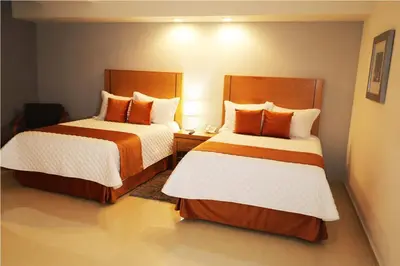 Cama o camas de una habitación en HB Córdoba
