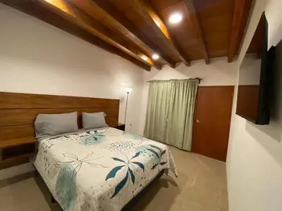 Cama o camas de una habitación en Casa de la Abuelita