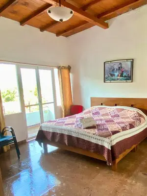 Cama o camas de una habitación en Hotel Casa Maximiliano