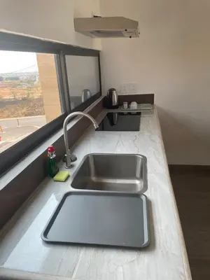 Una cocina o zona de cocina en Condominio cerca salida norte Lomas de Cocoyoc