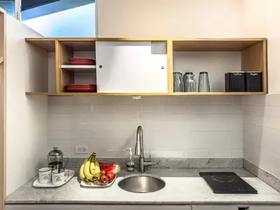Una cocina o zona de cocina en Cute Quiet Studio, Smart TV, Six Flags 1 km