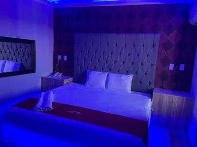 Cama o camas de una habitación en AUTO HOTEl MONTE CARLO