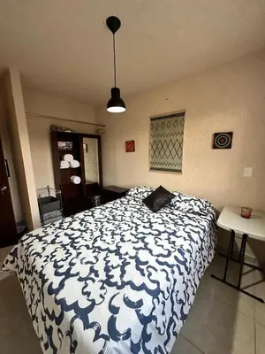 Cama o camas de una habitación en Departamento completo en Acapulco Diamante