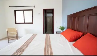 Cama o camas de una habitación en Palenque El Rey de Matatlán