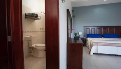 Cama o camas de una habitación en Palenque El Rey de Matatlán