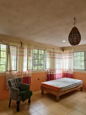 Cama o camas de una habitación en Jardín de los Anturios, Xico