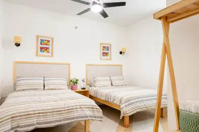 Cama o camas de una habitación en Casa Cataleya Refugio Bohemio y Romántico en Oaxaca