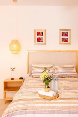 Cama o camas de una habitación en Casa Cataleya Refugio Bohemio y Romántico en Oaxaca