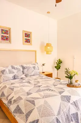 Cama o camas de una habitación en Casa Cataleya Refugio Bohemio y Romántico en Oaxaca