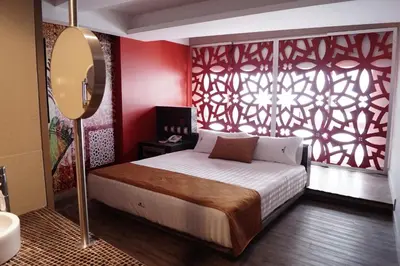Cama o camas de una habitación en Hotel Amala