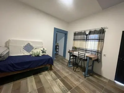 Cama o camas de una habitación en Casa de Huespedes Real 2