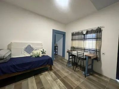 Cama o camas de una habitación en Casa de Huespedes Real 2