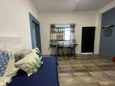 Cama o camas de una habitación en Casa de Huespedes Real 2